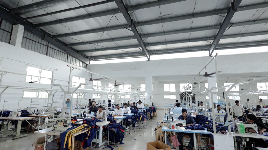The stitching line at Vastra Mahal, Bareilly, with operators at work